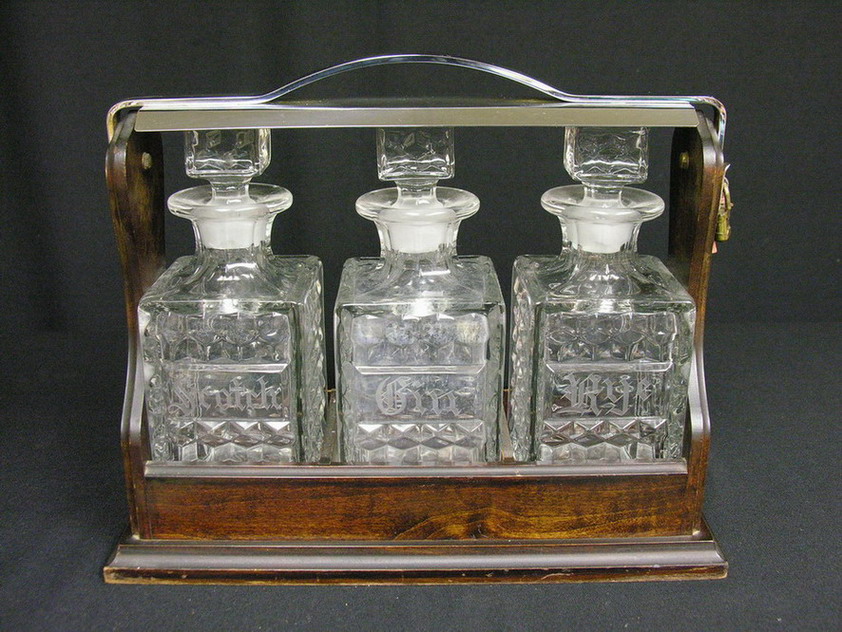 Appraisal: AMERICAN FOSTORIA DECANTER SET scotch gin and rye