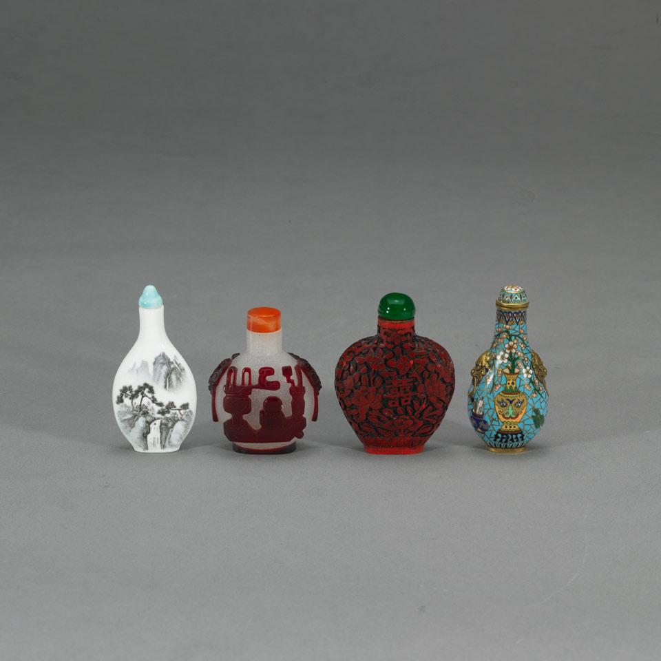 Appraisal: Four Snuff Bottles A porcelain famille verte landscape bottle a