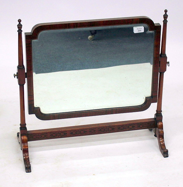 Appraisal: AN TH CENTURY STYLE WALNUT FRAMED SWING TOILET MIRROR of