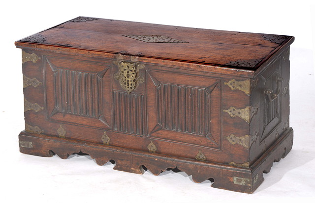 Appraisal: A COLONIAL PROBABLY INDIAN TEAK CHEST with hinged rising lid