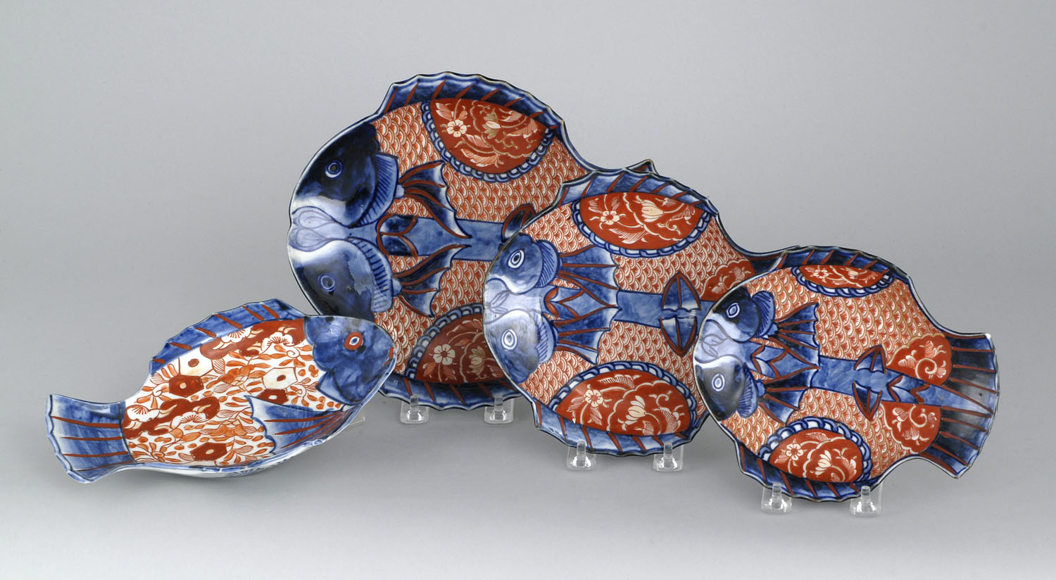 Appraisal: FOUR IMARI PORCELAIN DISHES Late Meiji PeriodEach in fish form