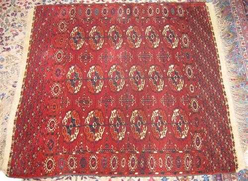 Appraisal: SMALL TEKKE BOCHARA old Red ground with three gul rows