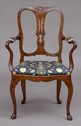 Appraisal: DUTCH ROCOCO MARQUETRY-INLAID WALNUT ARMCHAIR The pierced top rail above