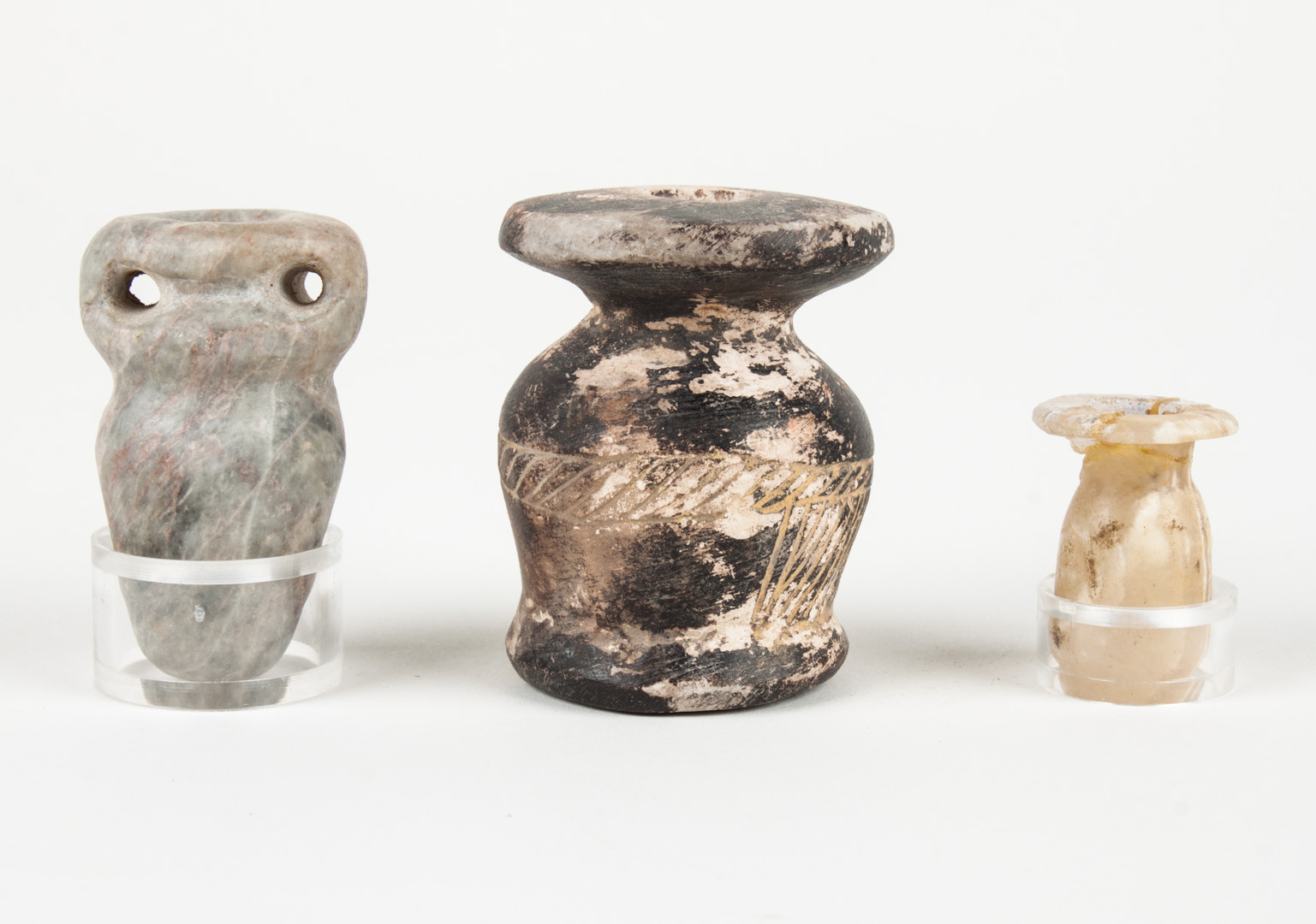 Appraisal: Three ancient Egyptian stone cosmetic jars comprising alabaster th Dynasty