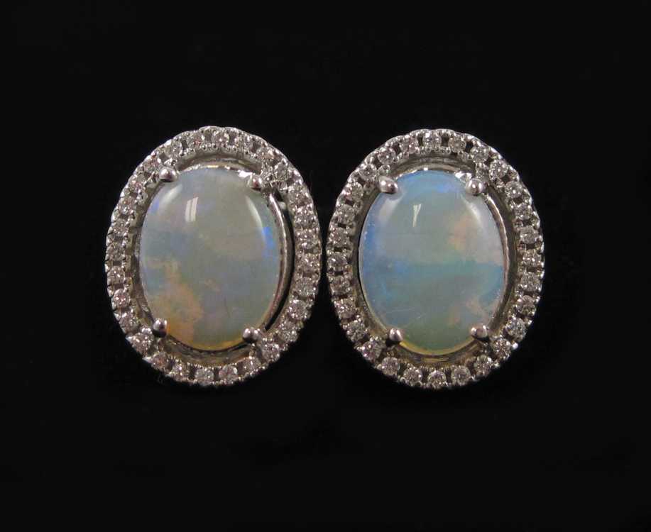 Appraisal: PAIR OF JELLY OPAL AND DIAMOND EARRINGS each k white