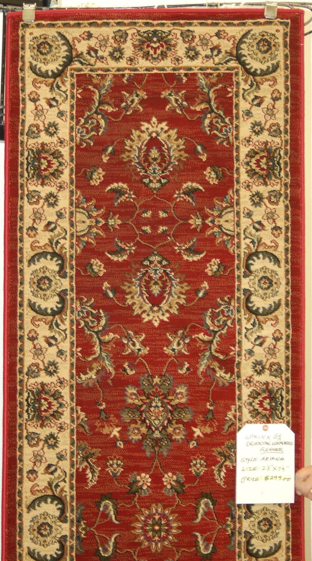 Appraisal: ORIENTAL MACHINE MADE RUNNER consisting of a striated red field