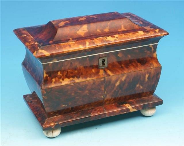 Appraisal: A th Century tortoiseshell tea caddy of sarcophagus form with