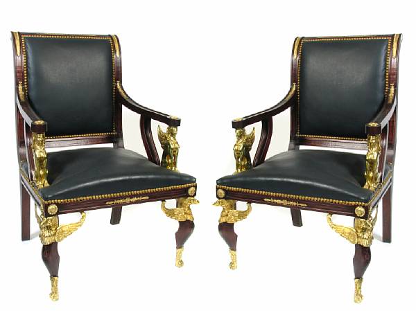 Appraisal: A pair of Empire style gilt bronze mounted armchairs height