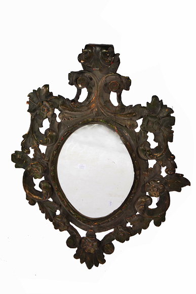 Appraisal: A LARGE OVAL WALL MIRROR with carved and painted scrolling