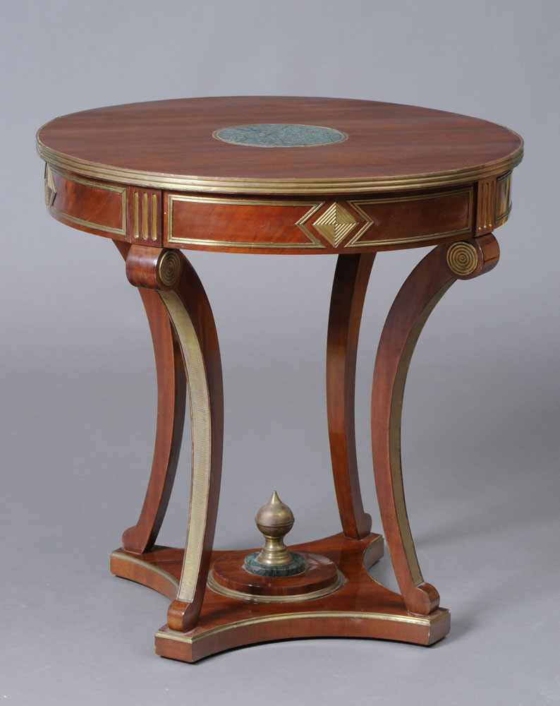 Appraisal: RUSSIAN NEOCLASSICAL BRASS-MOUNTED MAHOGANY CENTER TABLE The circular top with