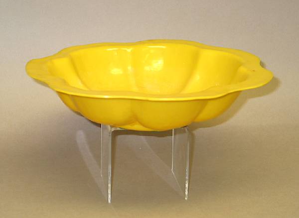 Appraisal: A yellow Peking glass floriform bowl Republic Period Thinly molded