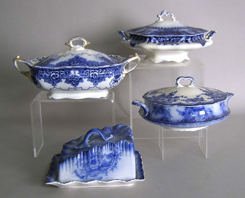 Appraisal: Three flow blue covered tureens together with a butter dish