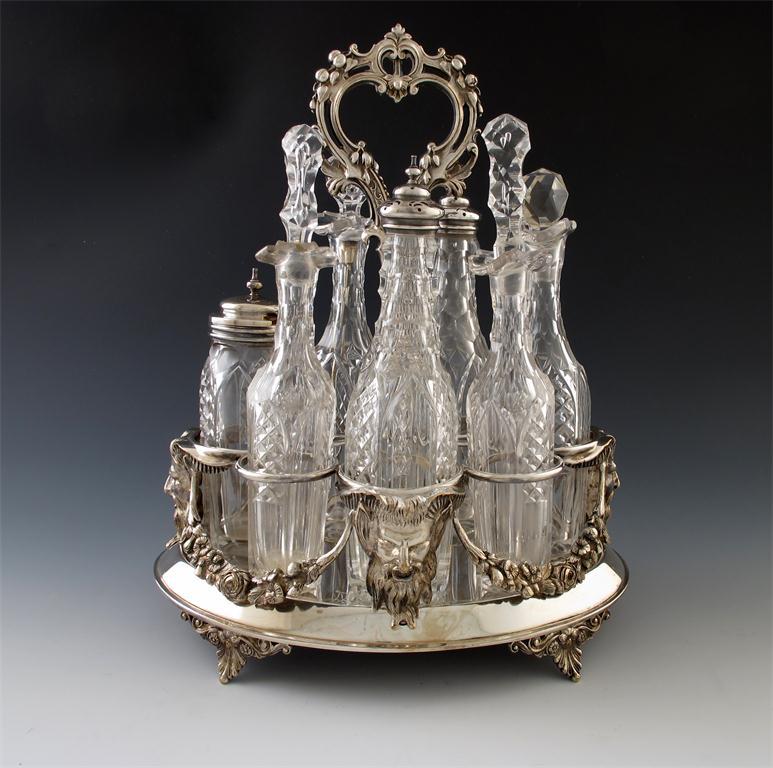 Appraisal: A Victorian electroplated seven bottle cruet frame