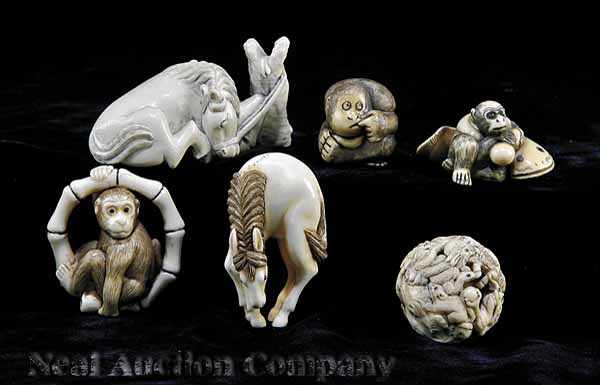 Appraisal: A Group of Six Japanese Ivory Netsuke including a ball