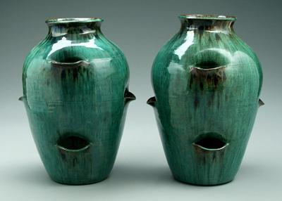 Appraisal: Pair North Carolina strawberry pots runny green and brown glaze