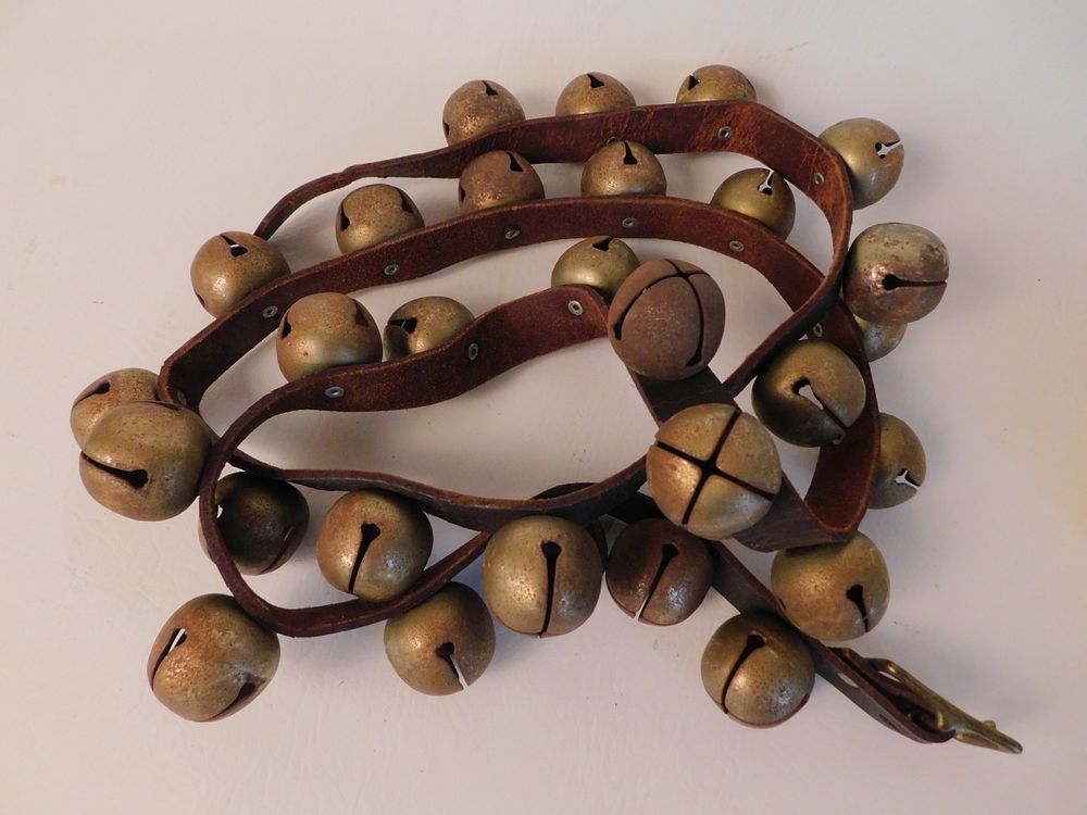 Appraisal: SLEIGH BELLS ON LEATHER BELT Old set of sleigh bells