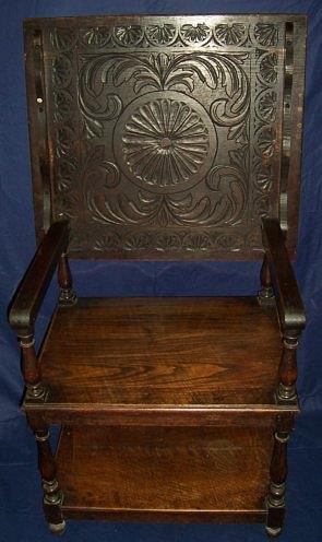 Appraisal: A monk's carved oak bench th Century the top with