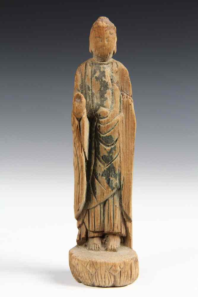 Appraisal: EARLY BUDDHIST CARVING- probably Japanese statuette depicting standing Buddha soft