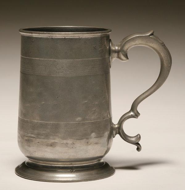 Appraisal: George IV English pewter tankard with scrolling handle Marked on