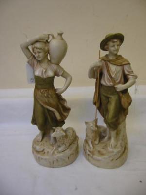 Appraisal: A PAIR OF ROYAL DUX PORCELAIN FIGURES of a shepherd