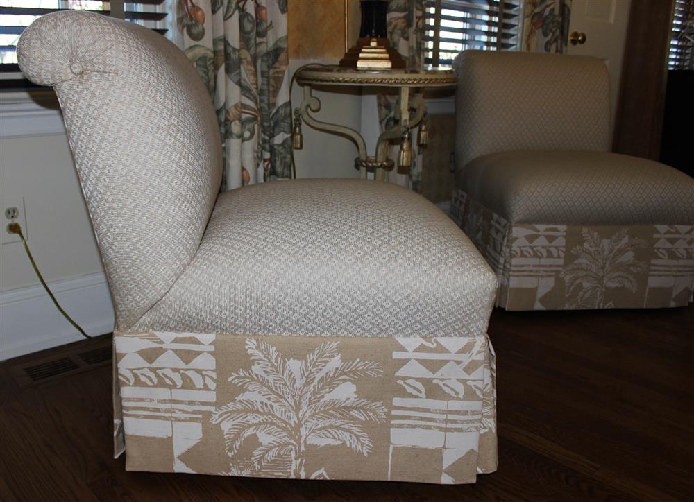 Appraisal: PAIR OF PALM TREE UPHOLSTERED CREAM SLIPPER CHAIRS with coordinating