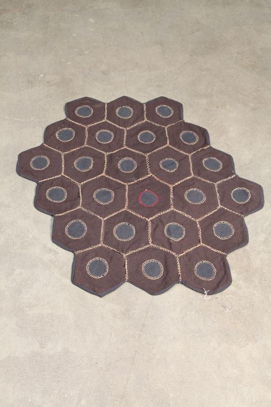 Appraisal: PENNY RUG The small rug is made up of hexagonal