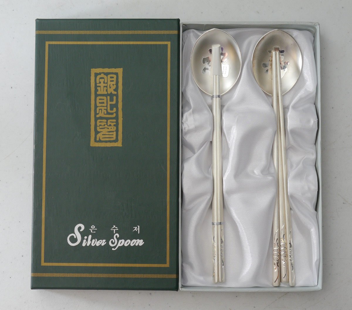 Appraisal: KOREAN FINE SILVER CHOP STICKS AND SPOONS To include spoons