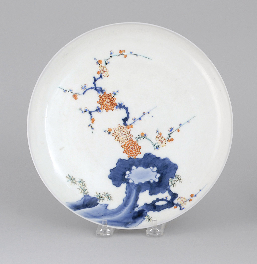 Appraisal: KAKIEMON PORCELAIN PLATE Late th CenturyWith flowering tree rockery and