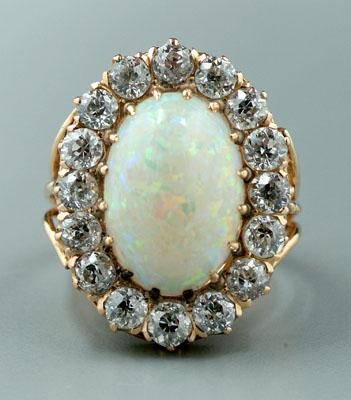 Appraisal: Opal and diamond ring oval cabochon white opal mm X