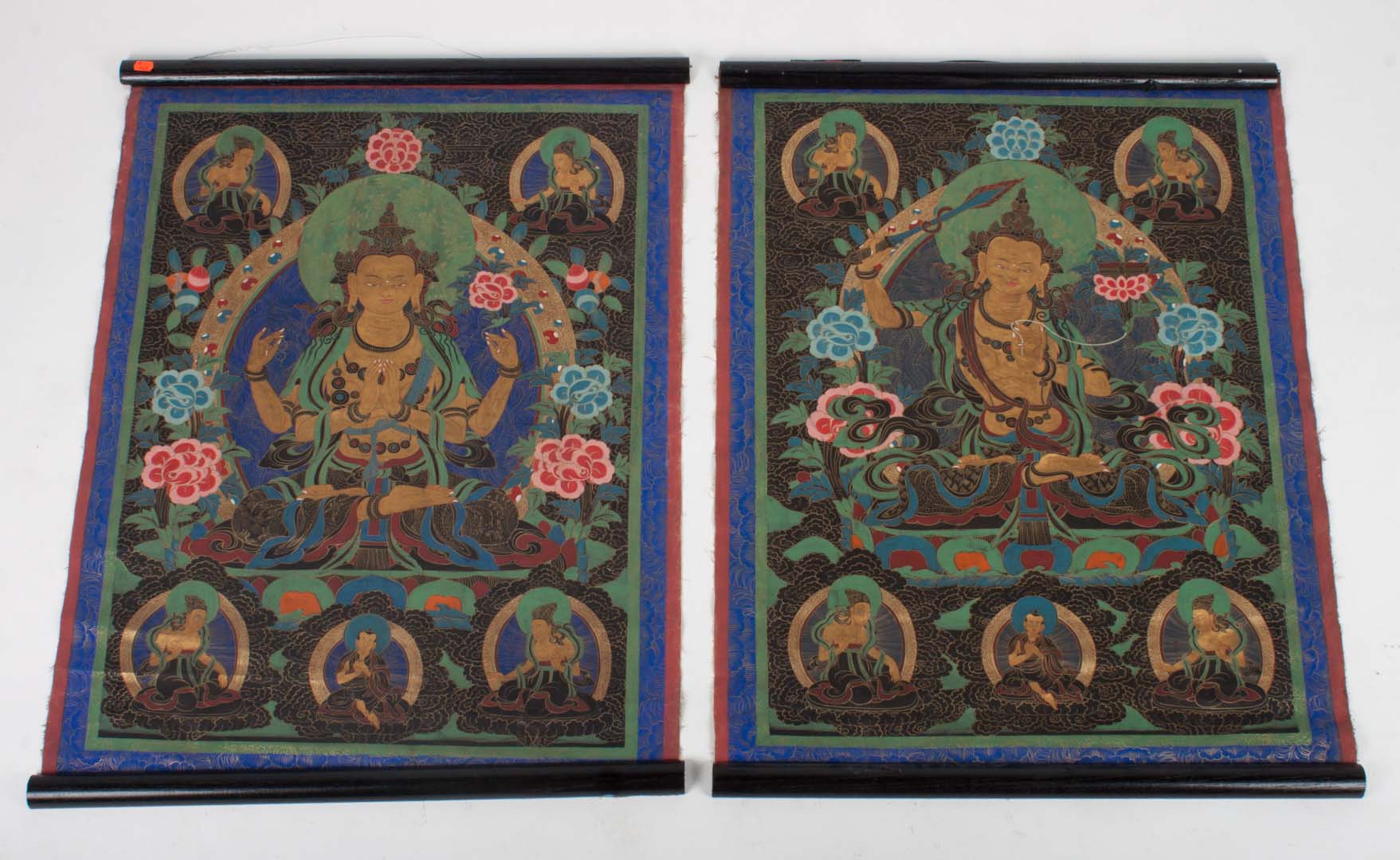 Appraisal: Pair of Tibetan tankas th century tempera and gilding on