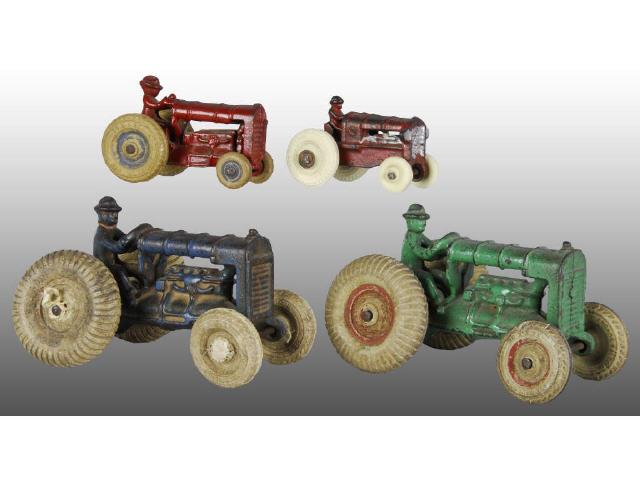 Appraisal: Lot of Cast Iron Arcade Tractor Toys Description All with