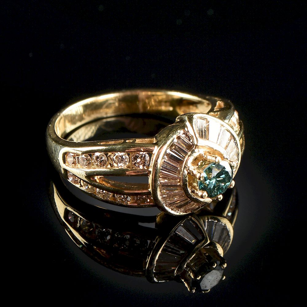 Appraisal: A K YELLOW GOLD AND BLUE DIAMOND LADY'S RING A