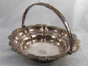 Appraisal: An Old Sheffield Plate lobed circular swing handled cake basket