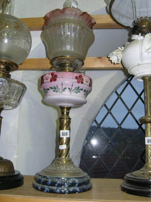 Appraisal: A late Victorian brass oil lamp base with embossed and