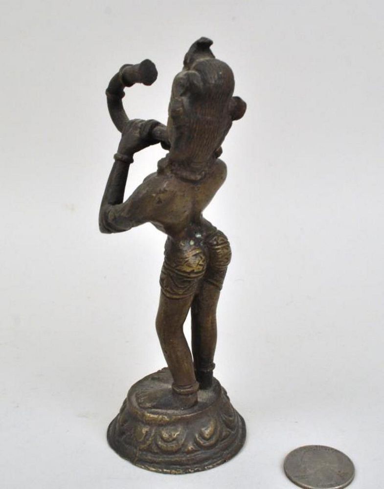 Appraisal: Indian Cast Alloy Figure of Musician a standing horn player