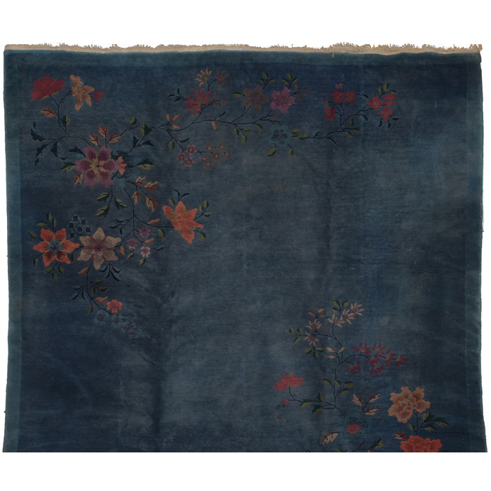 Appraisal: Art Deco Chinese rug c floral design on a blue