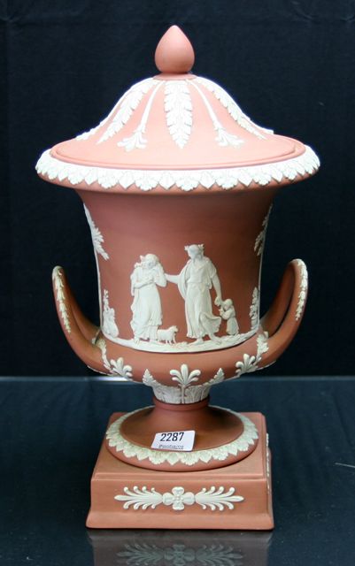 Appraisal: A Wedgwood jasperware urn and cover with moulded classical scene