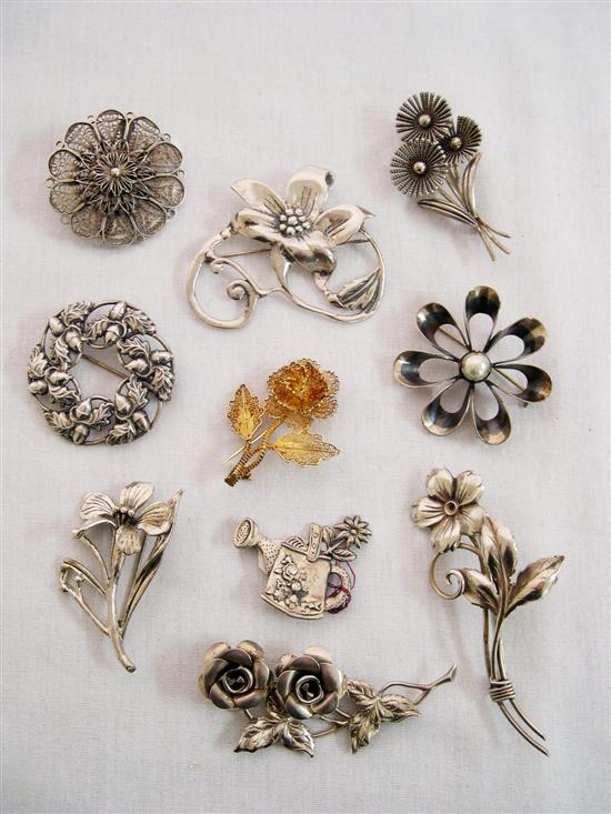 Appraisal: Sterling silver pins including nine floral and one with a