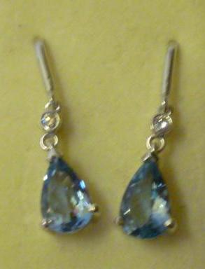 Appraisal: A PAIR OF AQUAMARINE AND DIAMOND EARRINGS the pear cut