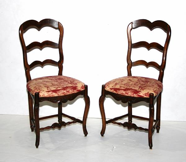 Appraisal: A set of four Louis XV style walnut chairs mid