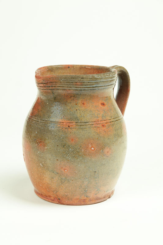 Appraisal: REDWARE PITCHER Gonic New Hampshire th century Incised lines and