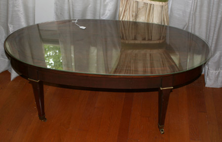 Appraisal: George III Style Crossbanded Mahogany Oval Cocktail Table Brandt th