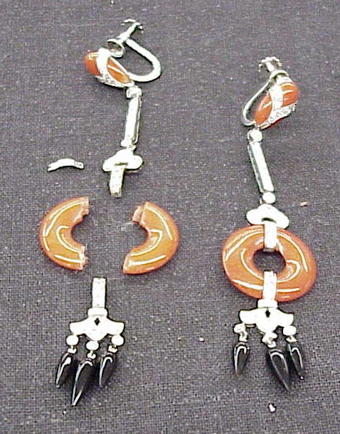 Appraisal: JEWELRY One pair of art deco coral and onyx diamond