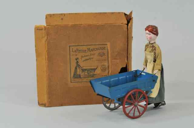 Appraisal: FERNAND MARTIN STREET VENDOR France tin toy open cart is