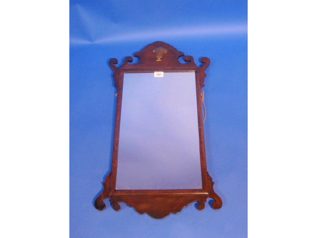 Appraisal: A mahogany and walnut pier glass in George II style