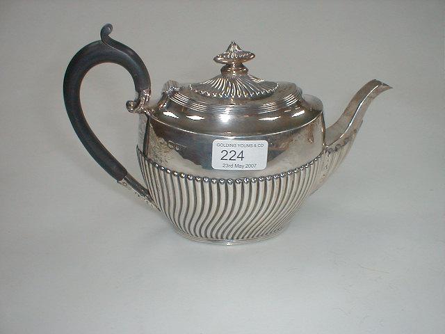 Appraisal: A Victorian silver part reeded oval teapot London assay oz