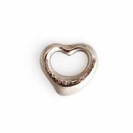 Appraisal: An ct white gold heart shaped charm by Tiffany Co