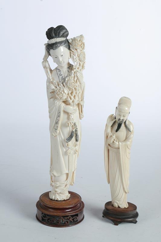 Appraisal: TWO IVORY FIGURES Chinese early th century Kwan Yin with