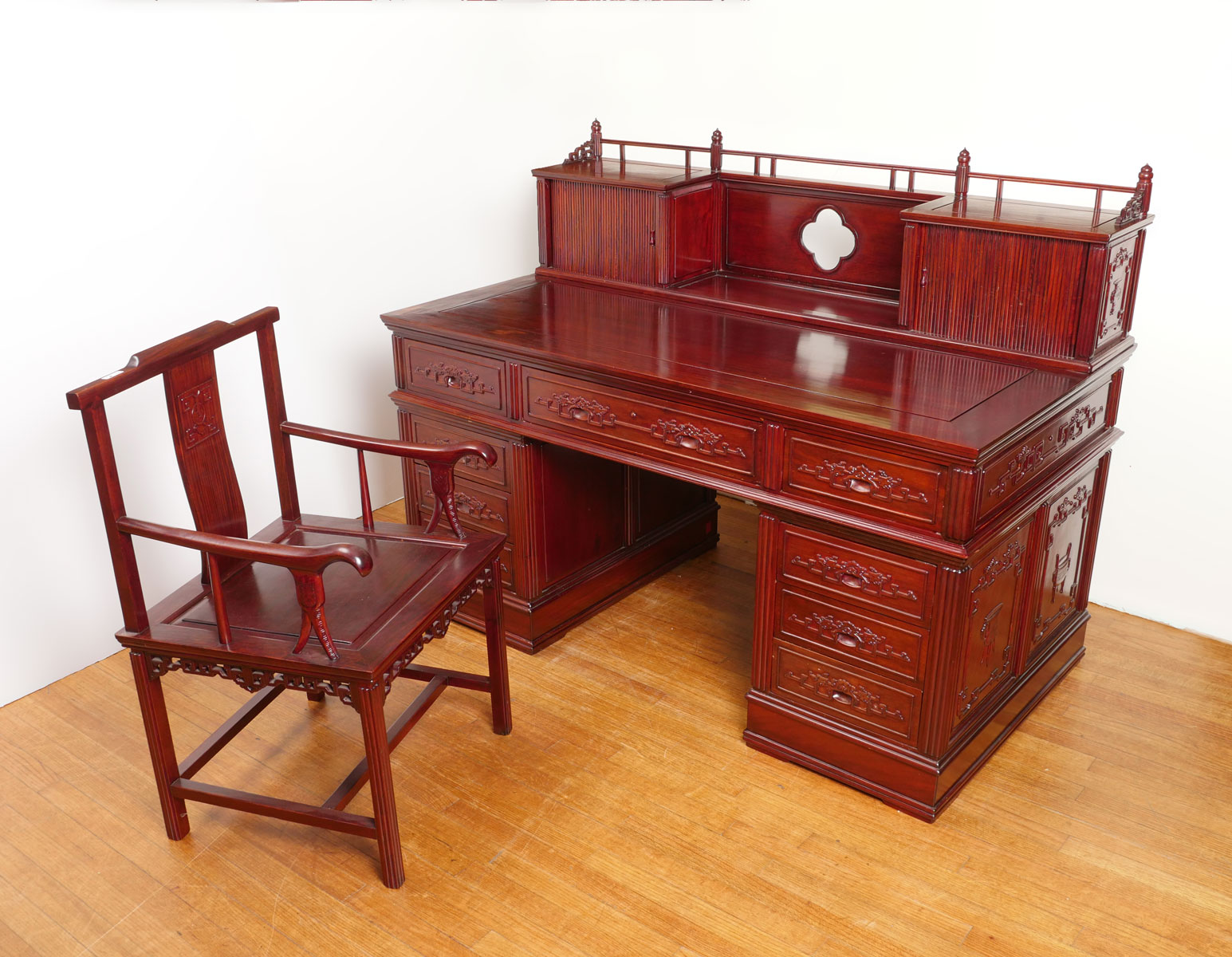 Appraisal: CARVED CHINESE DESK CHAIR Chinese Rosewood desk having a pierced