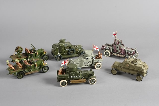 Appraisal: Lot of WWI metal vehicles Five armored cars staff car